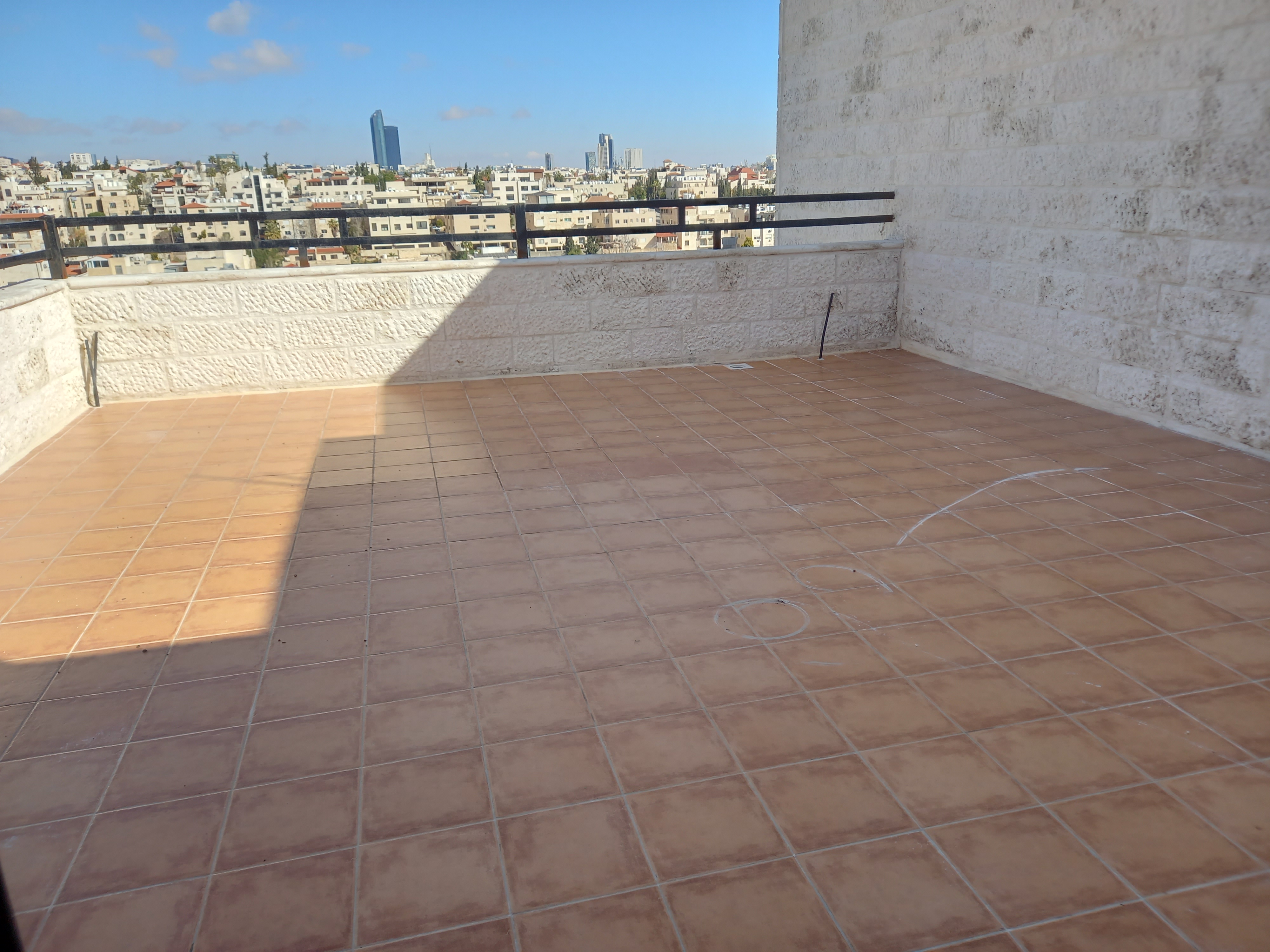 A fourth-floor apartment with a roof, available for rent or sale in Abdoun. - Property Image 10